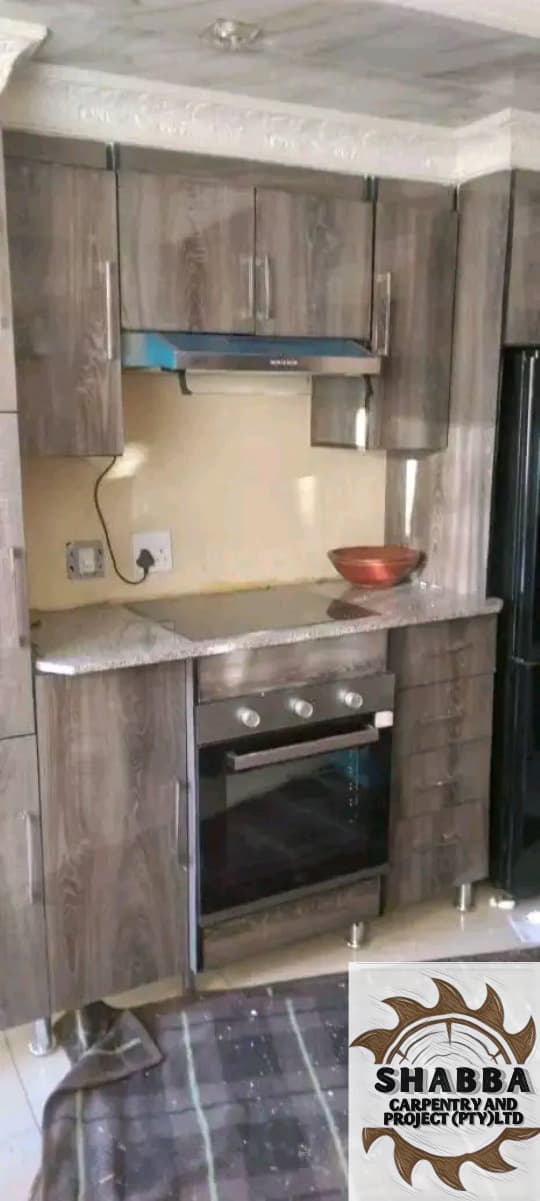 Kitchen units and oven housing